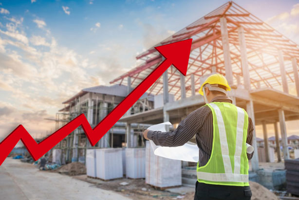 Construction Site worker with a cloudy day shown in the background with a large red arrow and line showing an upward trajectory