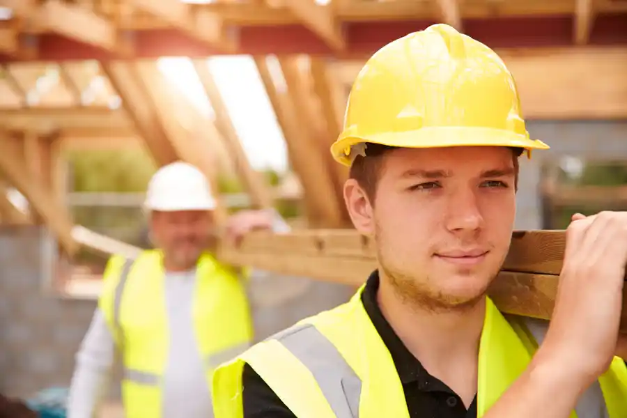 Workers on a construction site with the text from apprentice to master