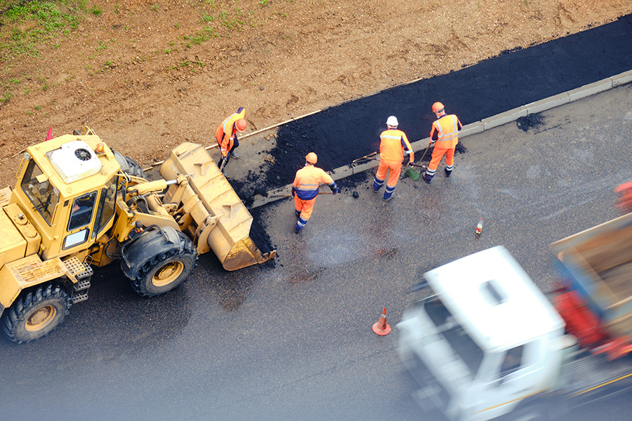 Groundworks and civils labourers working on site preparation