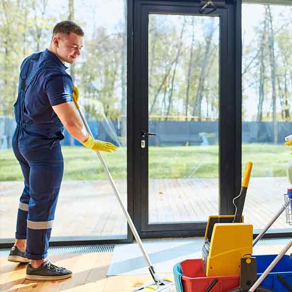 A square image showing a Cleaner at work