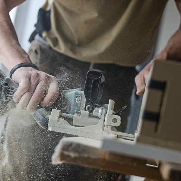 A square image showing a Joiner at work