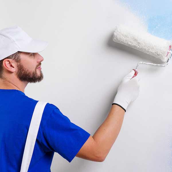 A square image showing a Painter and Decorator at work