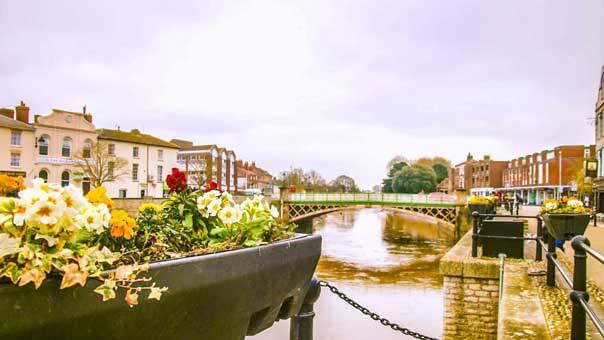 Bridgwater river and bridge showing flowers and railings