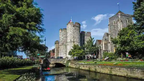 Old castle in kent, showing the river bridge and church
