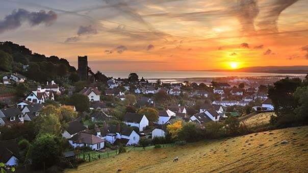Sunset view over minehead houses and beach