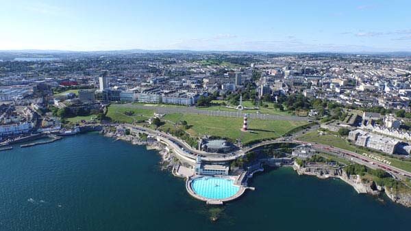 Aerial shot of Plyouth hoe followed by the rest of the city.