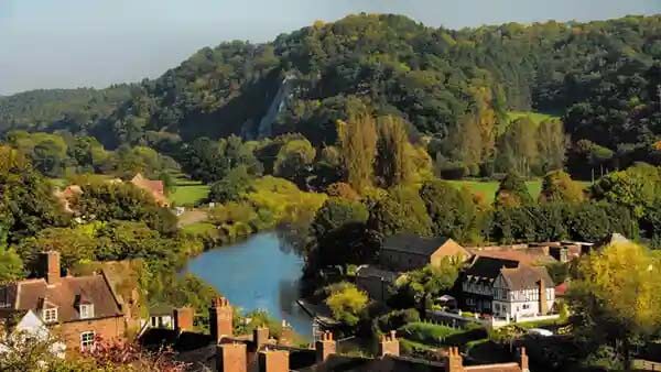 Scenic shot of shropshire town, river trees and hills.