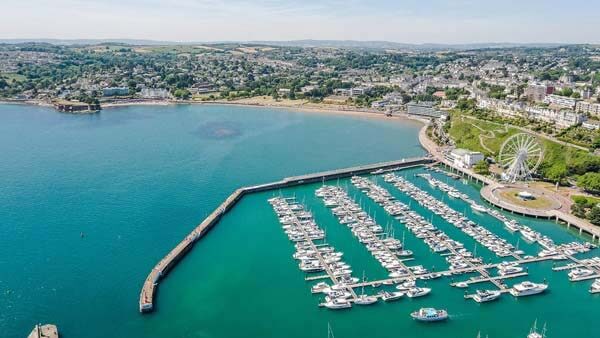 Aerial view of Torquay showing Torquay Marina and Torquay Beach / Torre Abbey Sands