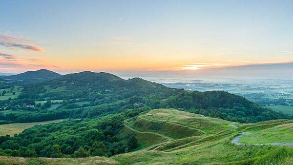 Scenic view of Worcestershire showing the Malvern hills and sunset