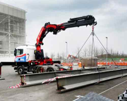 Civils heavy lifting project showing a crane truck lifting two steel beams